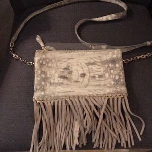 Soft leather zip with fringe Henry Bendel cream